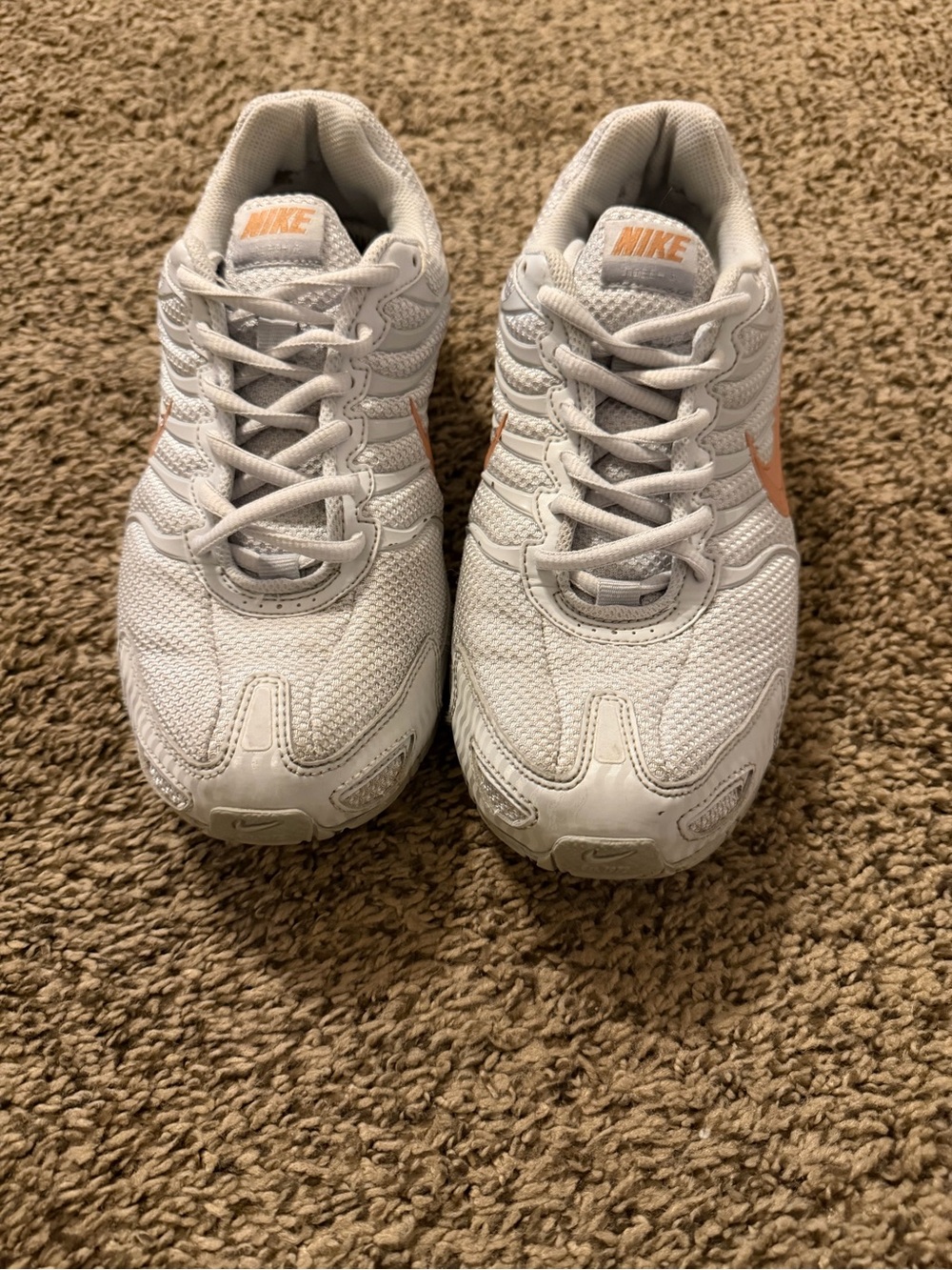 Nike Kids White Sneakers with Peach Swoosh